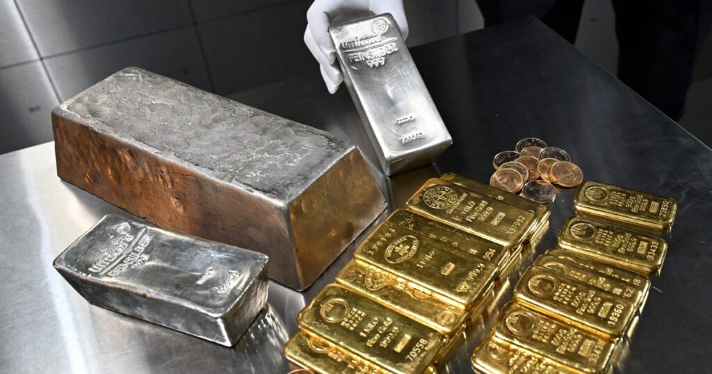 Gold and silver prices soared, then plummeted. What’s going on? | Business and Economy News